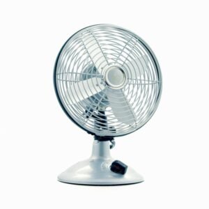 Close-up of a classic electric desk fan against a white background, showcasing retro design.